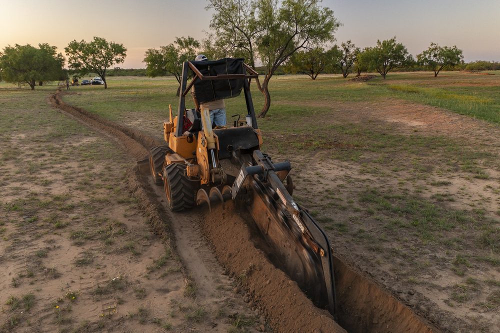 Sewer line repair on an excavated pipe